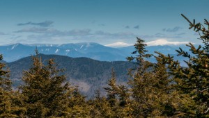 The Presidentials, with a fresh coat of white snow, dominate the view from Mount Carr.
